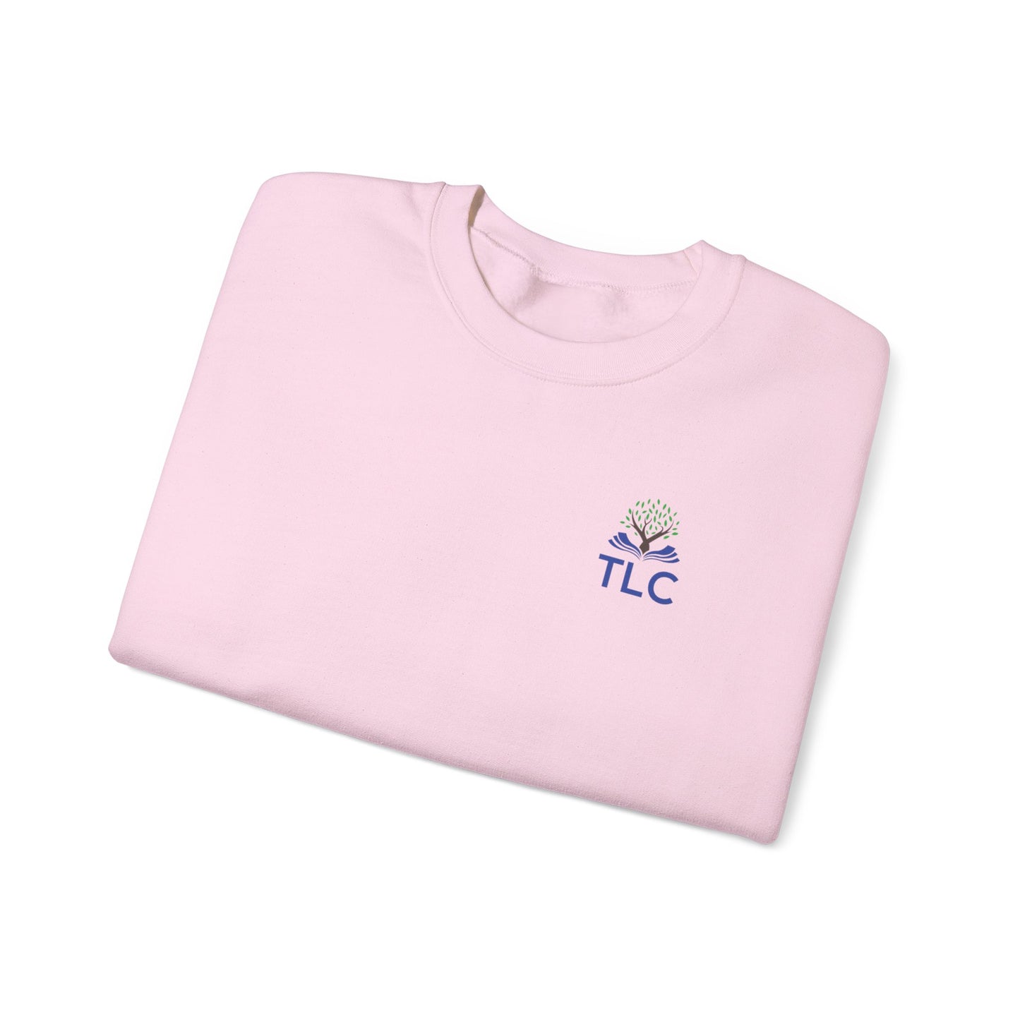 Folded pink shirt with 'TLC' logo on a white background