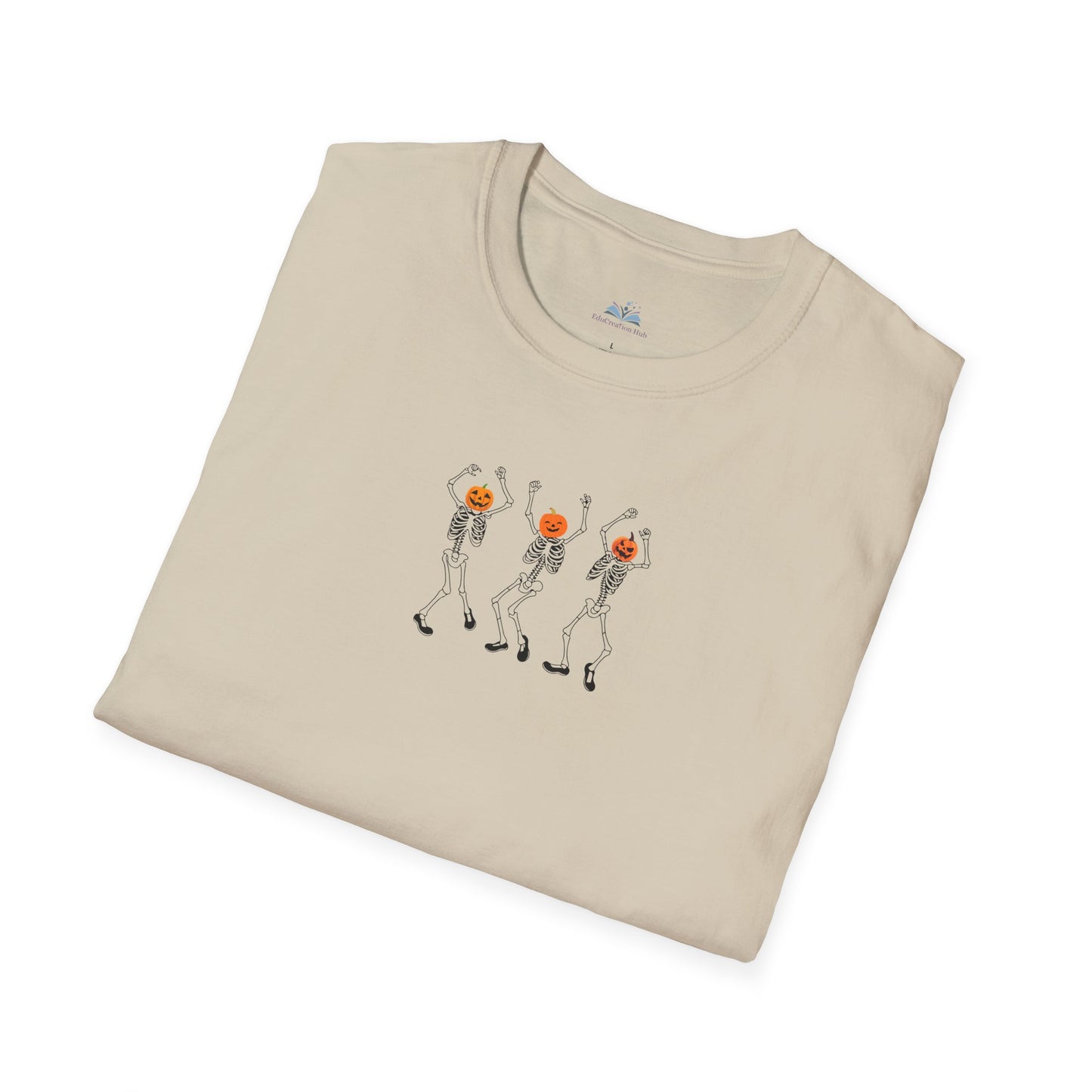 Folded beige t-shirt with skeleton design on a white background