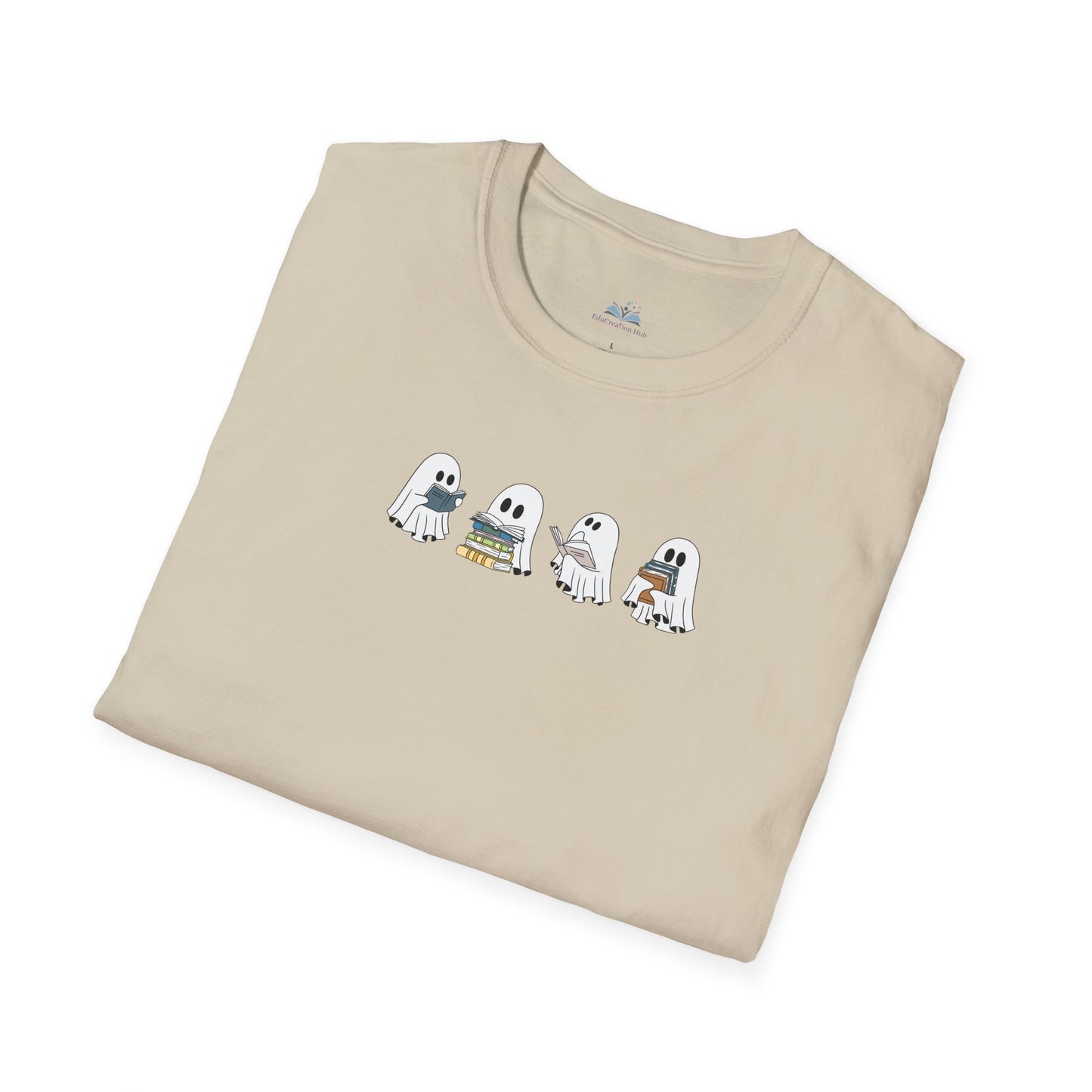 Folded beige t-shirt with cartoon ghosts design on a white background