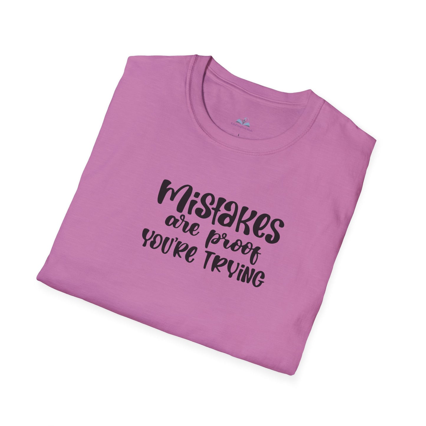 Folded pink t-shirt with black text on a white background