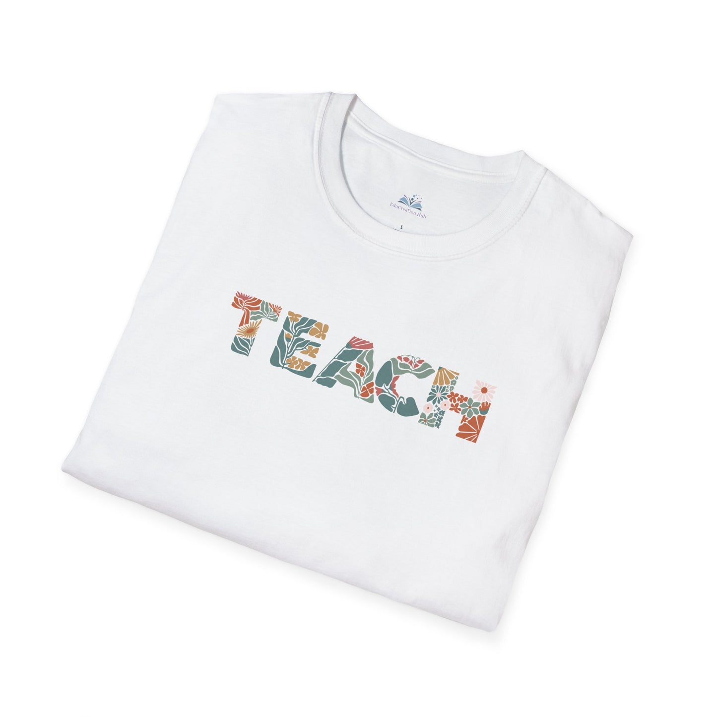 White t-shirt with 'TEACH' printed in colorful letters on a white background