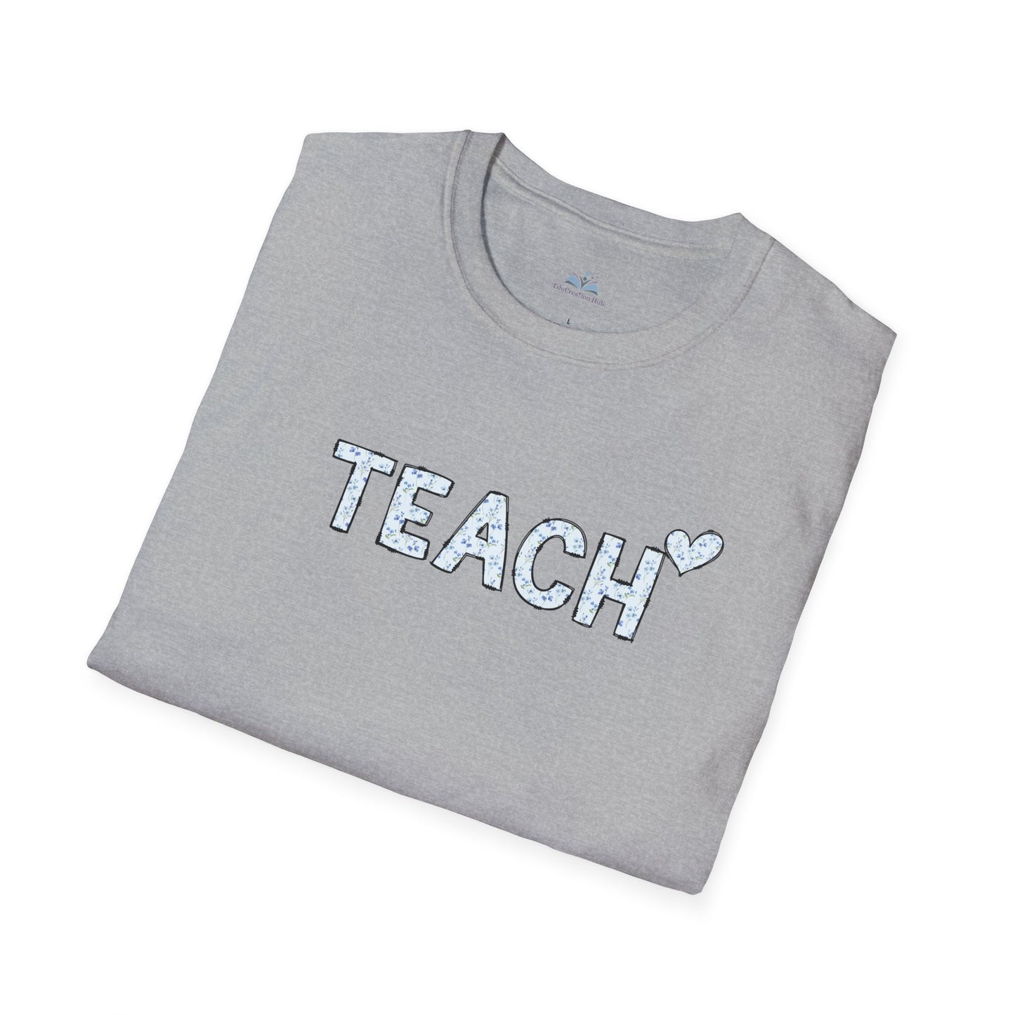 Folded gray t-shirt with 'TEACH' text on a white background