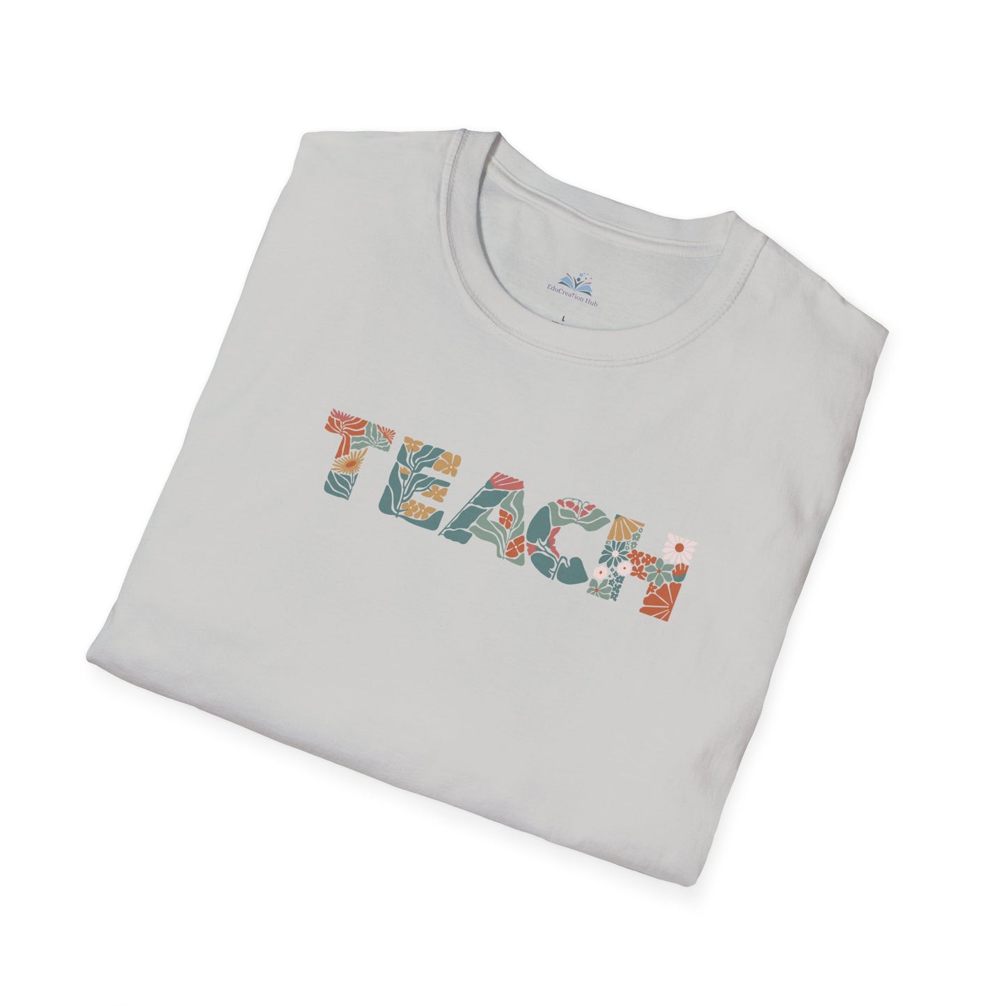Folded gray t-shirt with 'TEACH' text in colorful letters on a white background