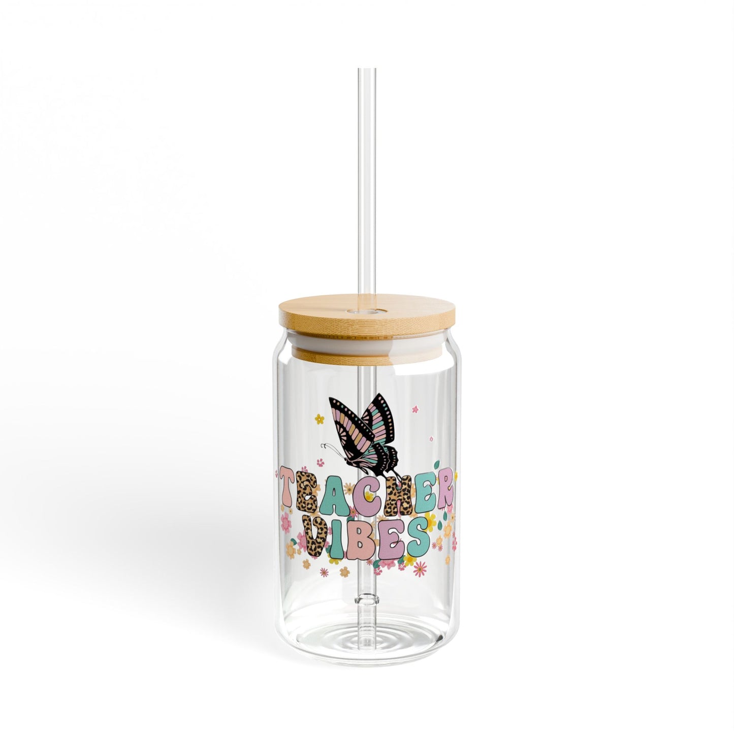 Clear tumbler with wooden lid and straw, featuring a butterfly and 'Teacher Vibes' text on a white background.