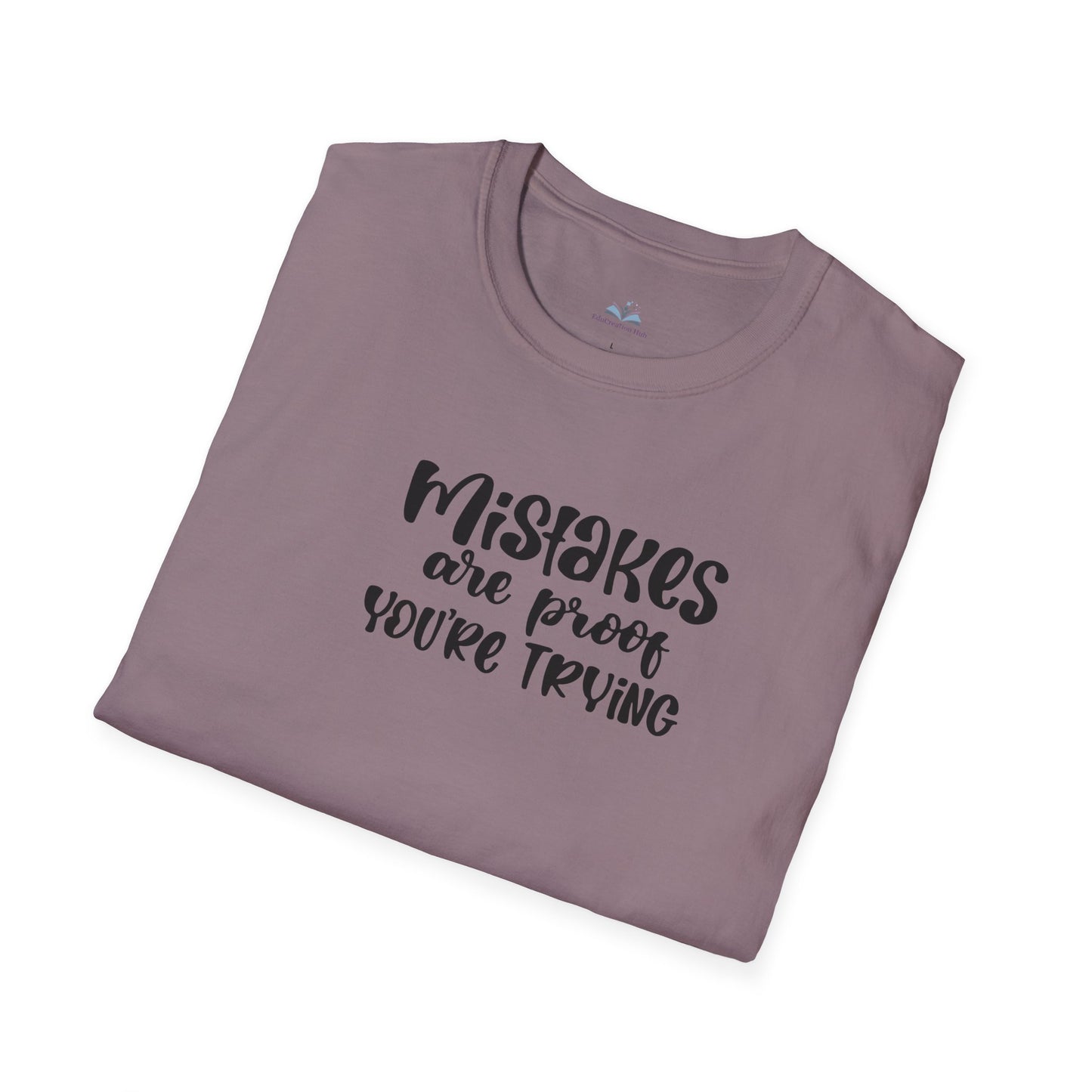 Folded purple t-shirt with motivational text on a white background