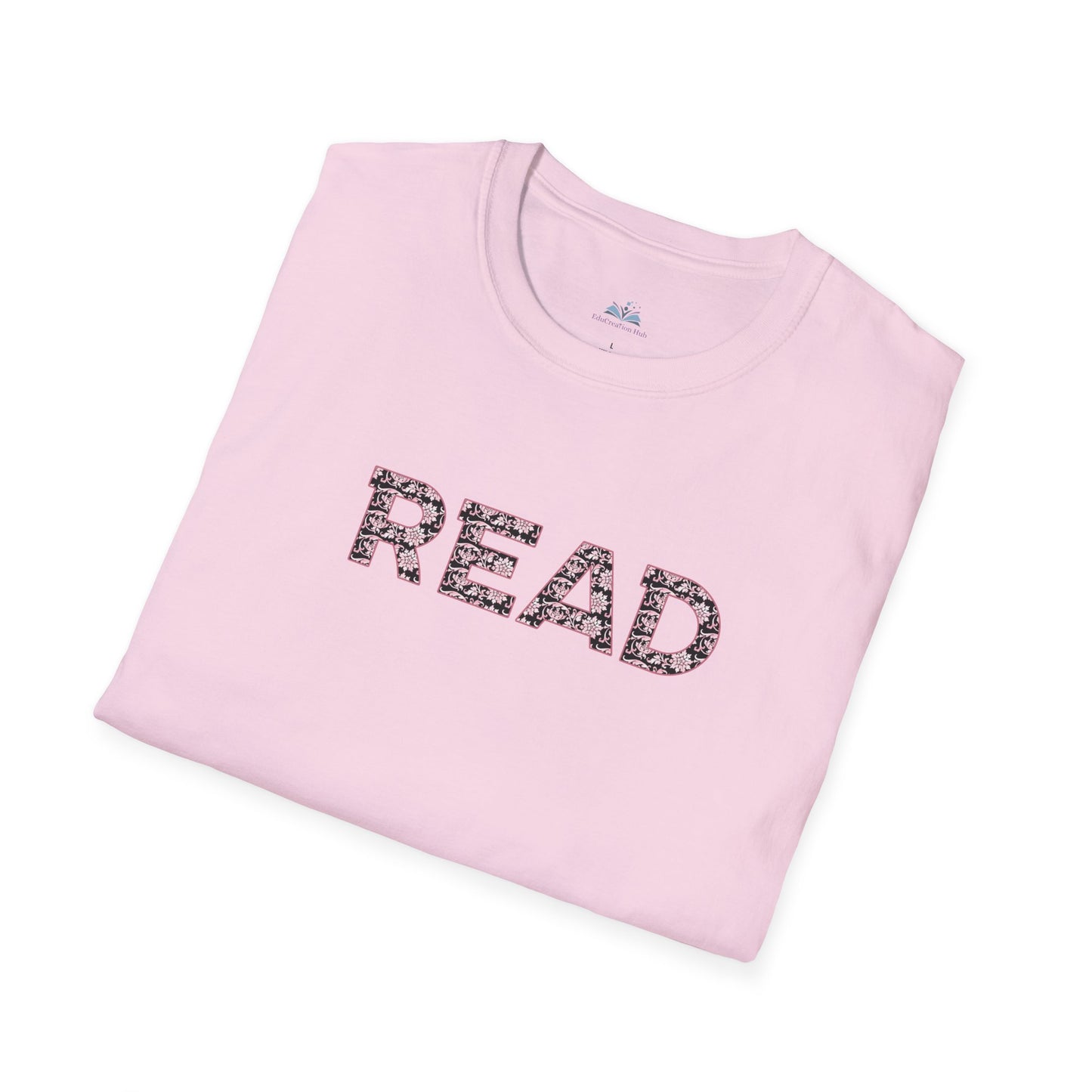 Folded pink t-shirt with 'READ' printed on it against a white background