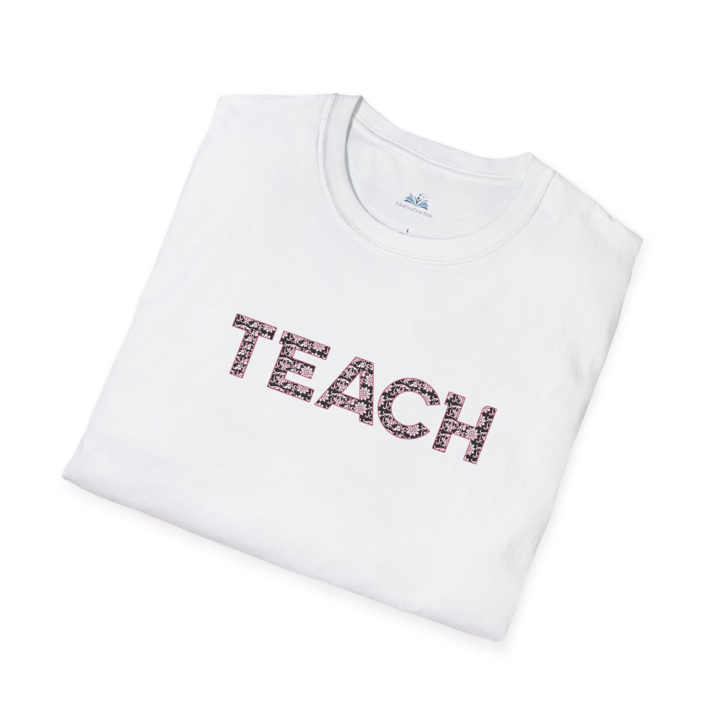 White t-shirt with 'TEACH' printed on it, folded on a white background