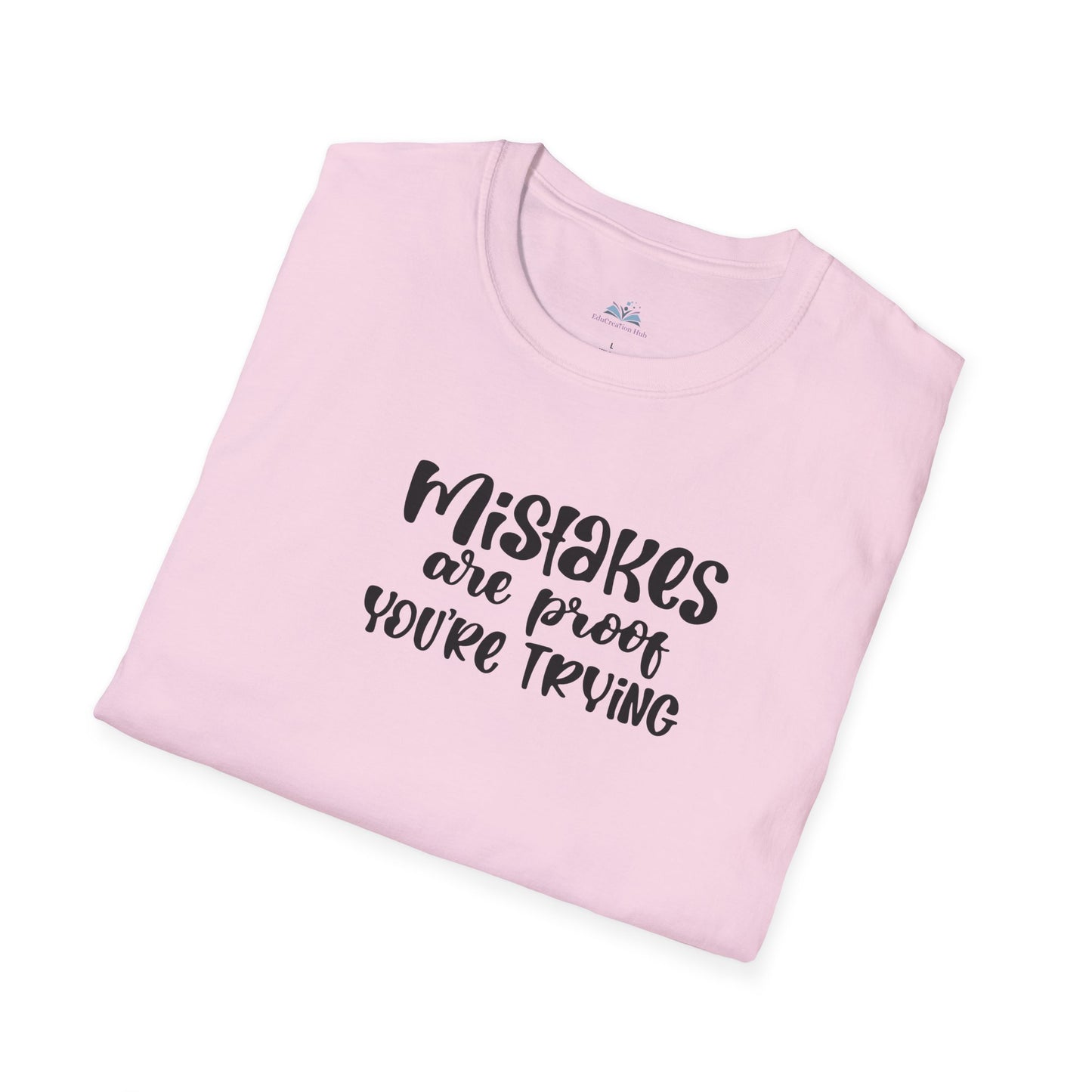 Folded pink t-shirt with black text on a white background