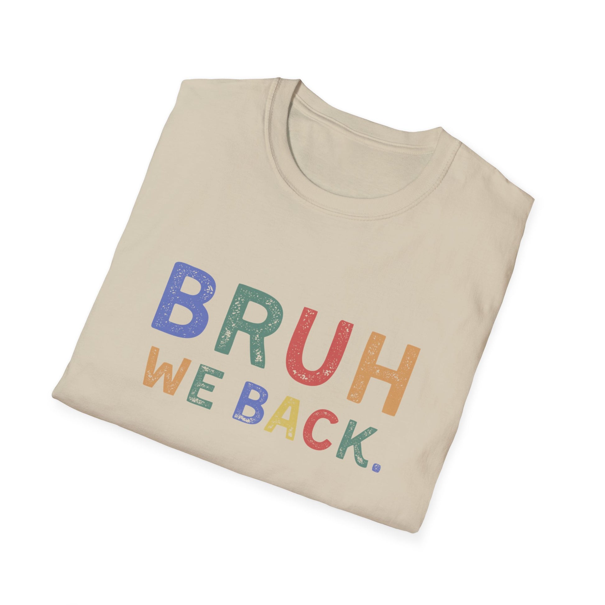 Folded beige t-shirt with colorful text 'BRUH WE BACK.' on a white background