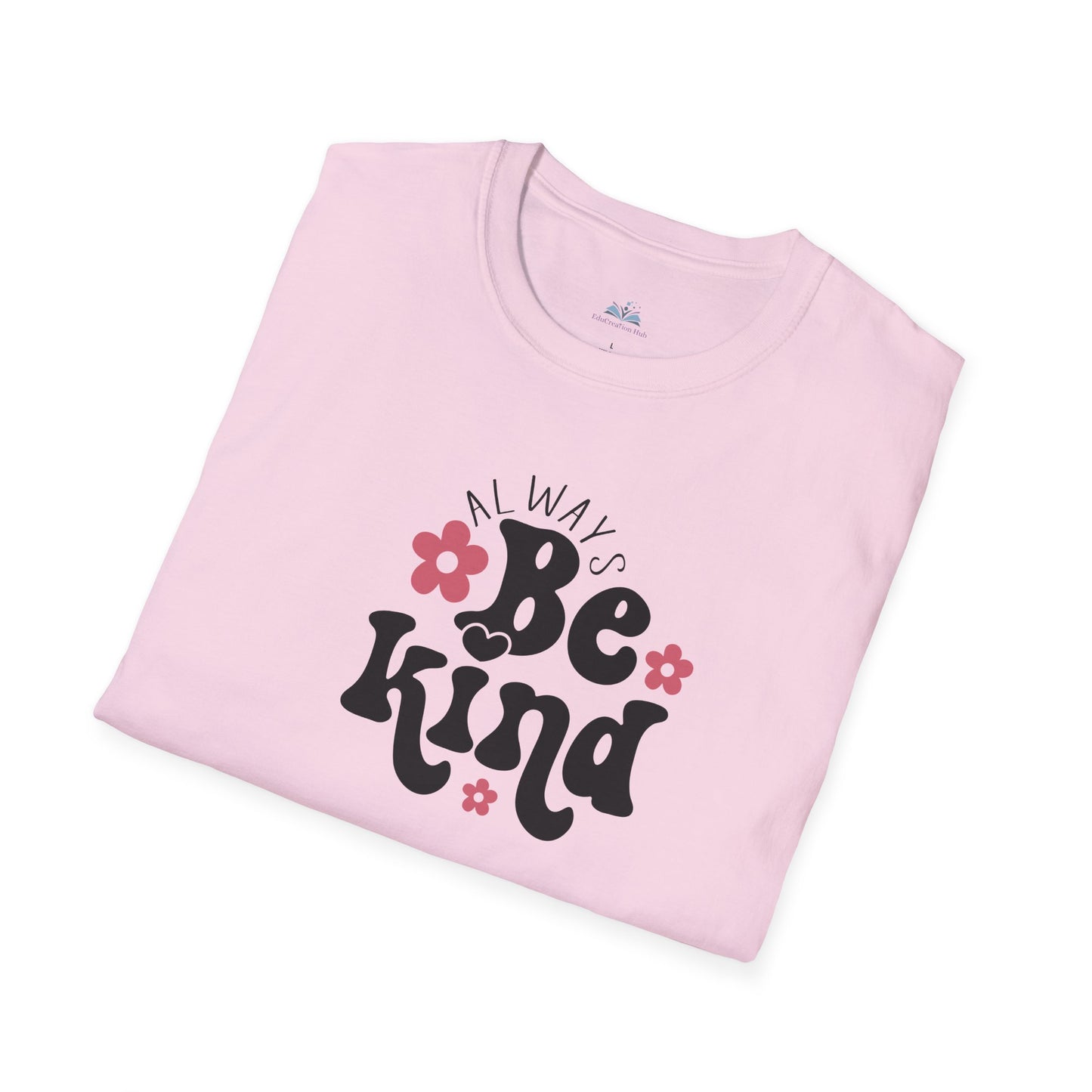 Folded pink t-shirt with 'Always Be Kind' text and flowers on a white background
