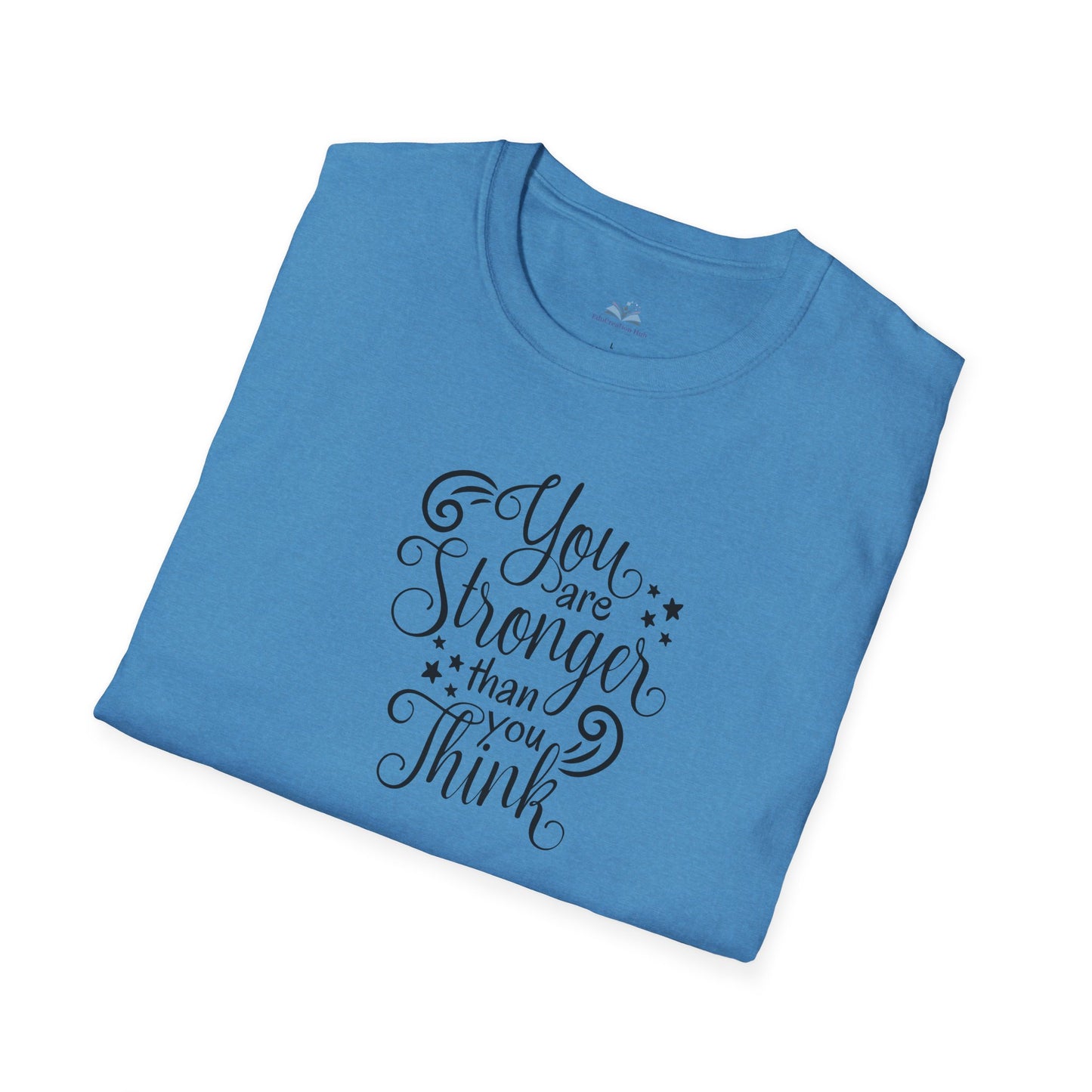 Folded blue t-shirt with motivational quote on a white background