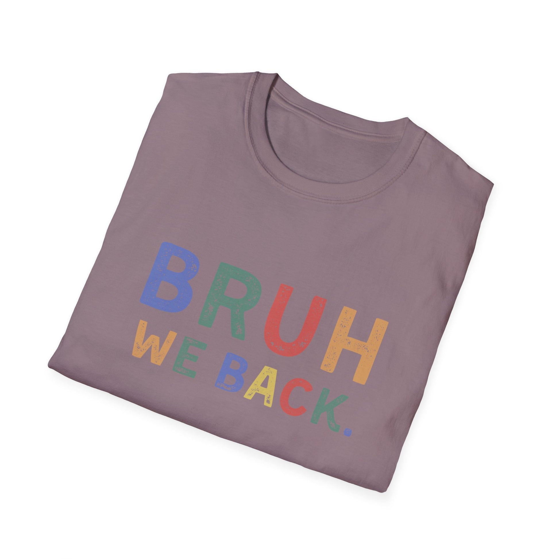 Folded purple t-shirt with colorful text 'BRUH WE BACK.' on a white background