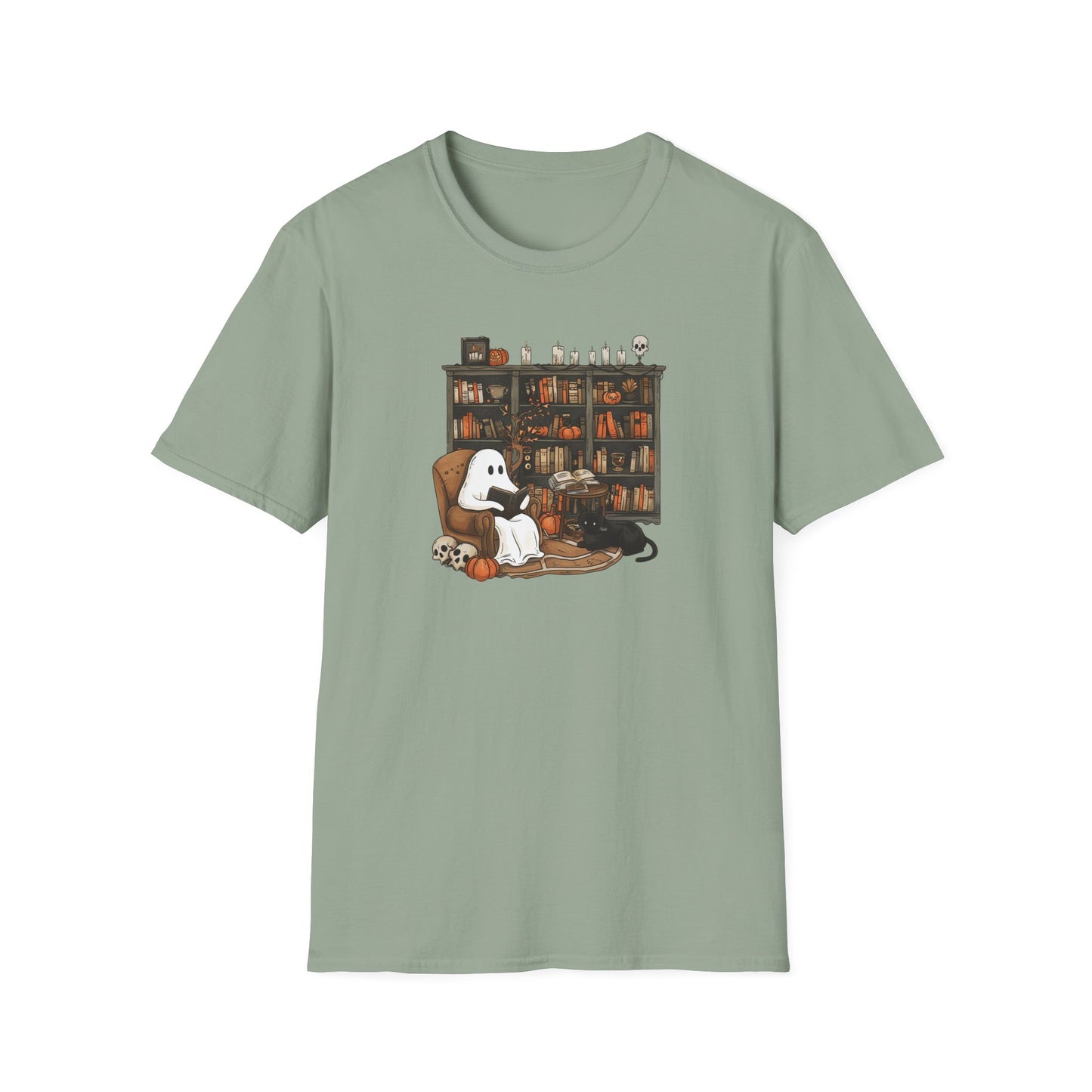 Sage green t-shirt with a graphic of a ghost, black cat, and dog in a room with books on a white background