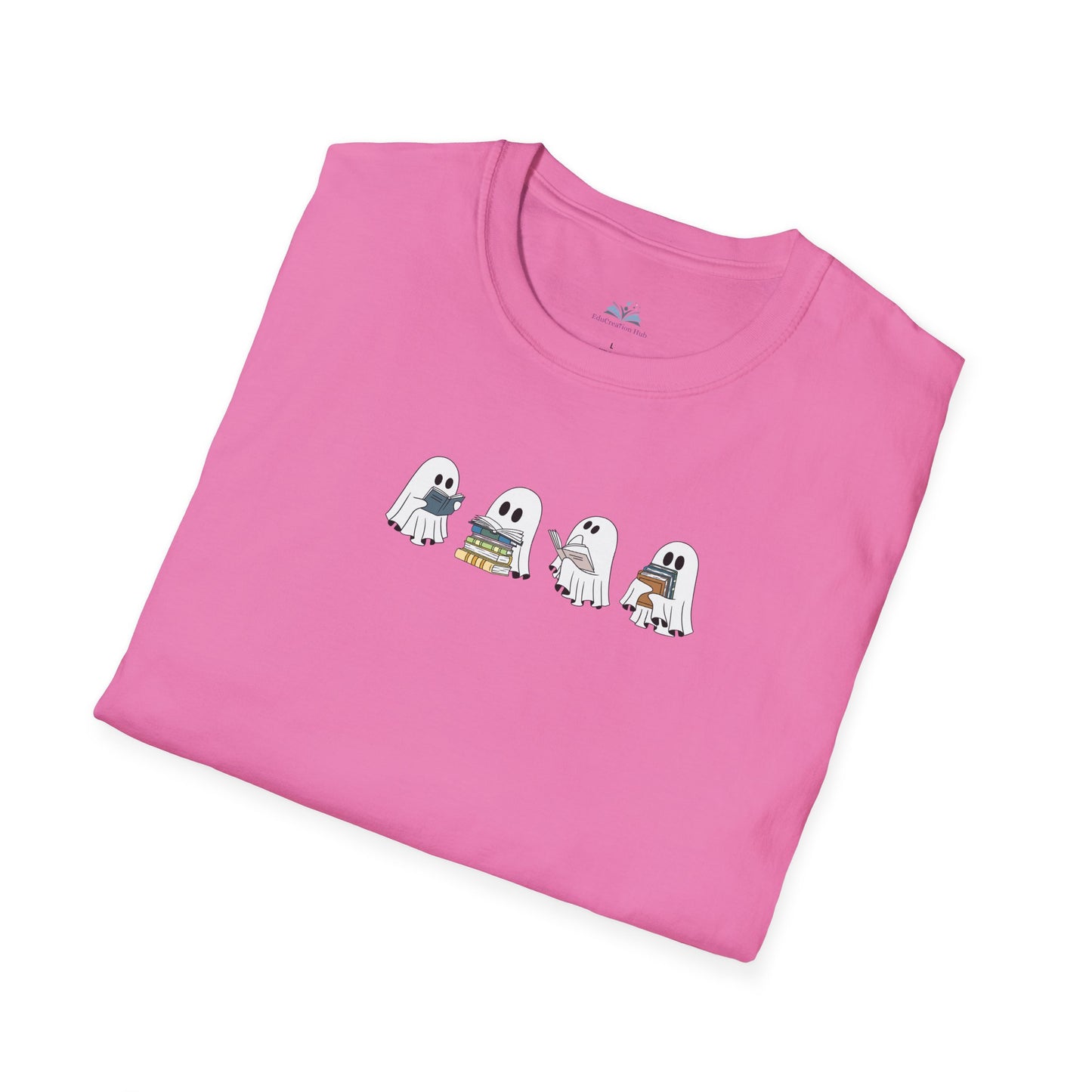 Folded pink t-shirt with cartoon ghost design on a white background