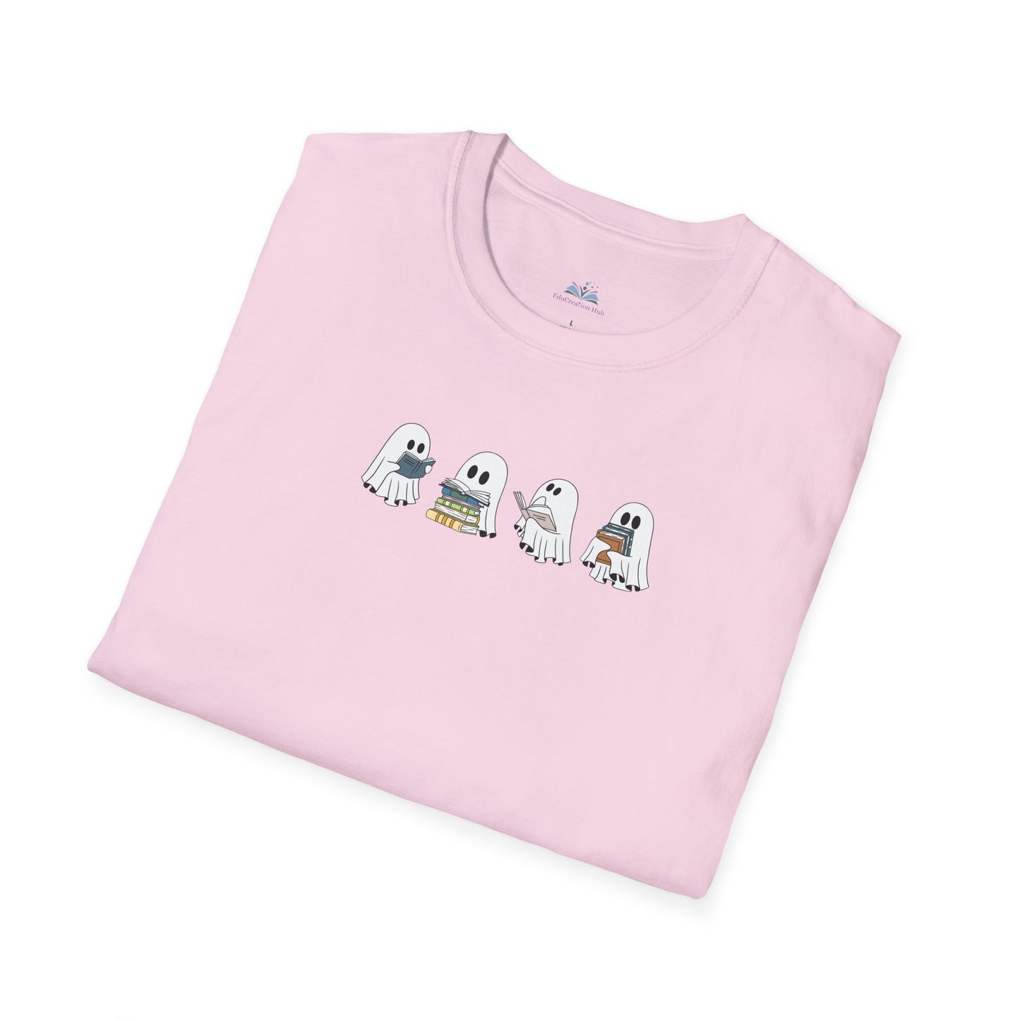 Folded pink t-shirt with cartoon ghost design on a white background