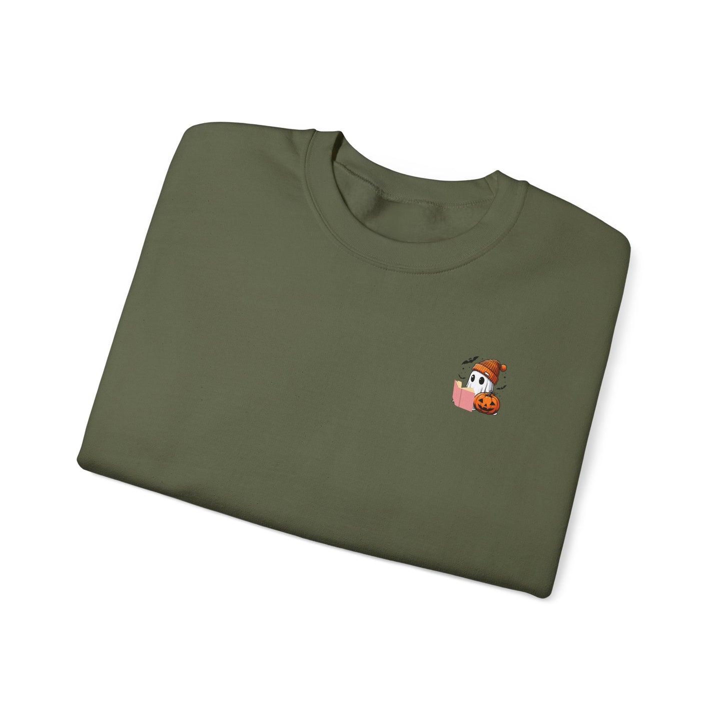 Folded green t-shirt with a small embroidered design on a white background