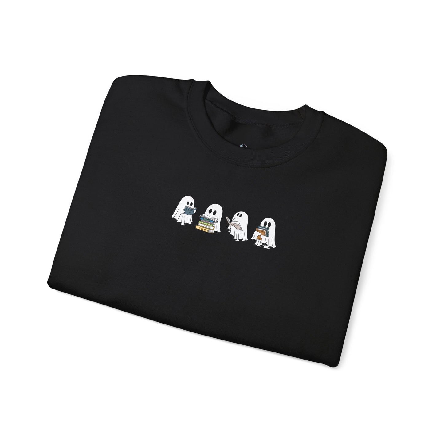 Folded black sweatshirt with cartoon ghost design on a white background