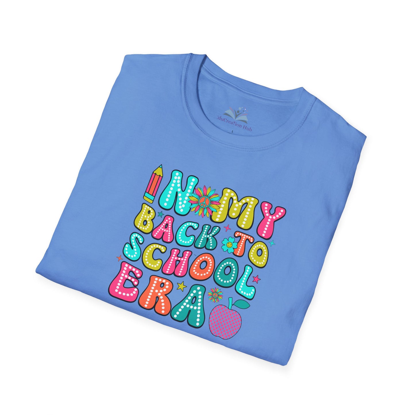 Folded blue t-shirt with colorful 'Back to School' text design on a white background