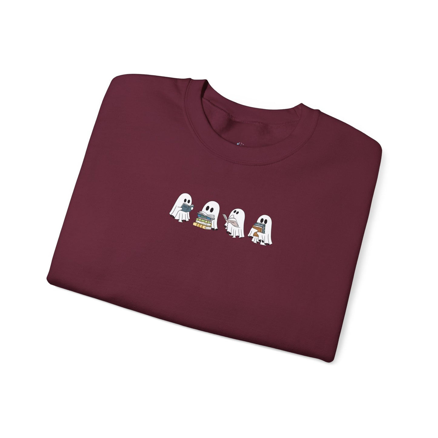 Folded maroon sweatshirt with cartoon ghost design on a white background