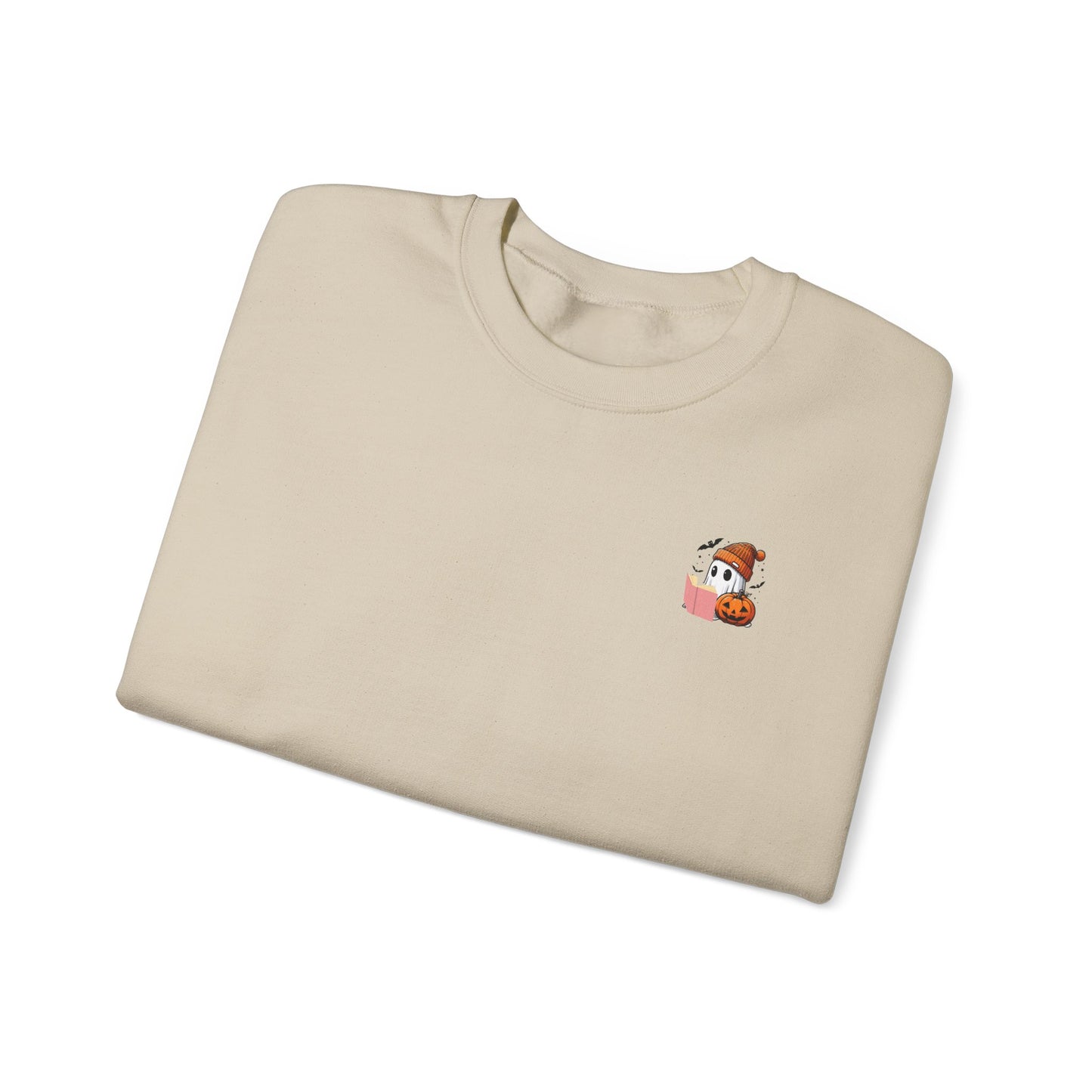 Folded beige t-shirt with a small graphic on a white background