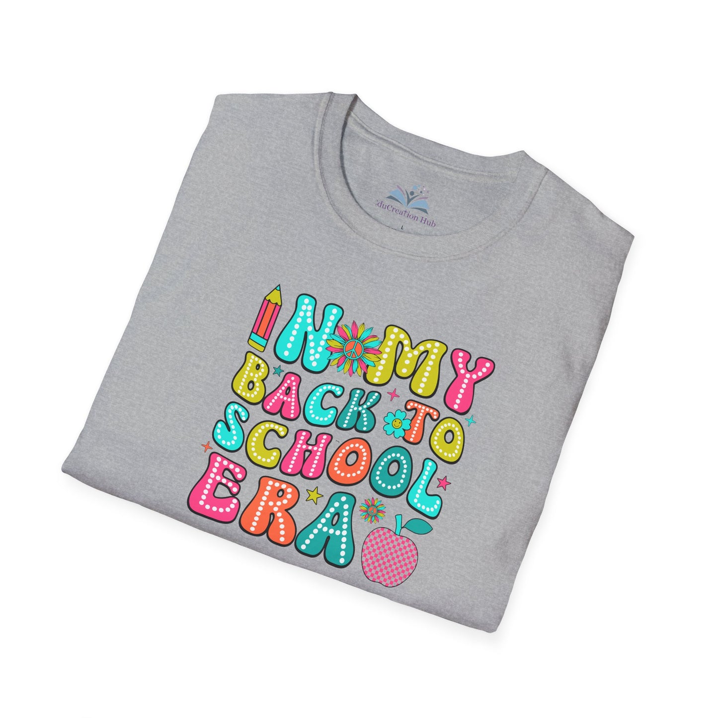 Folded gray t-shirt with colorful 'Back to School' text design on a white background