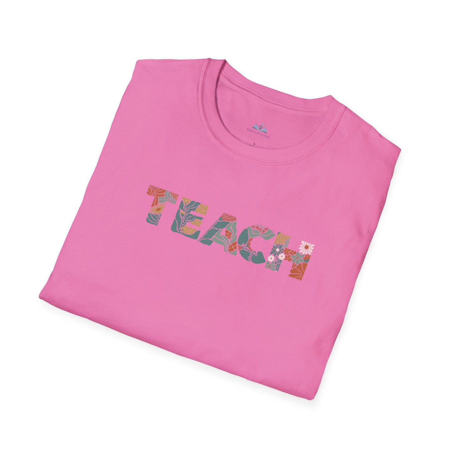 Pink t-shirt with 'TEACH' printed in colorful letters on a white background