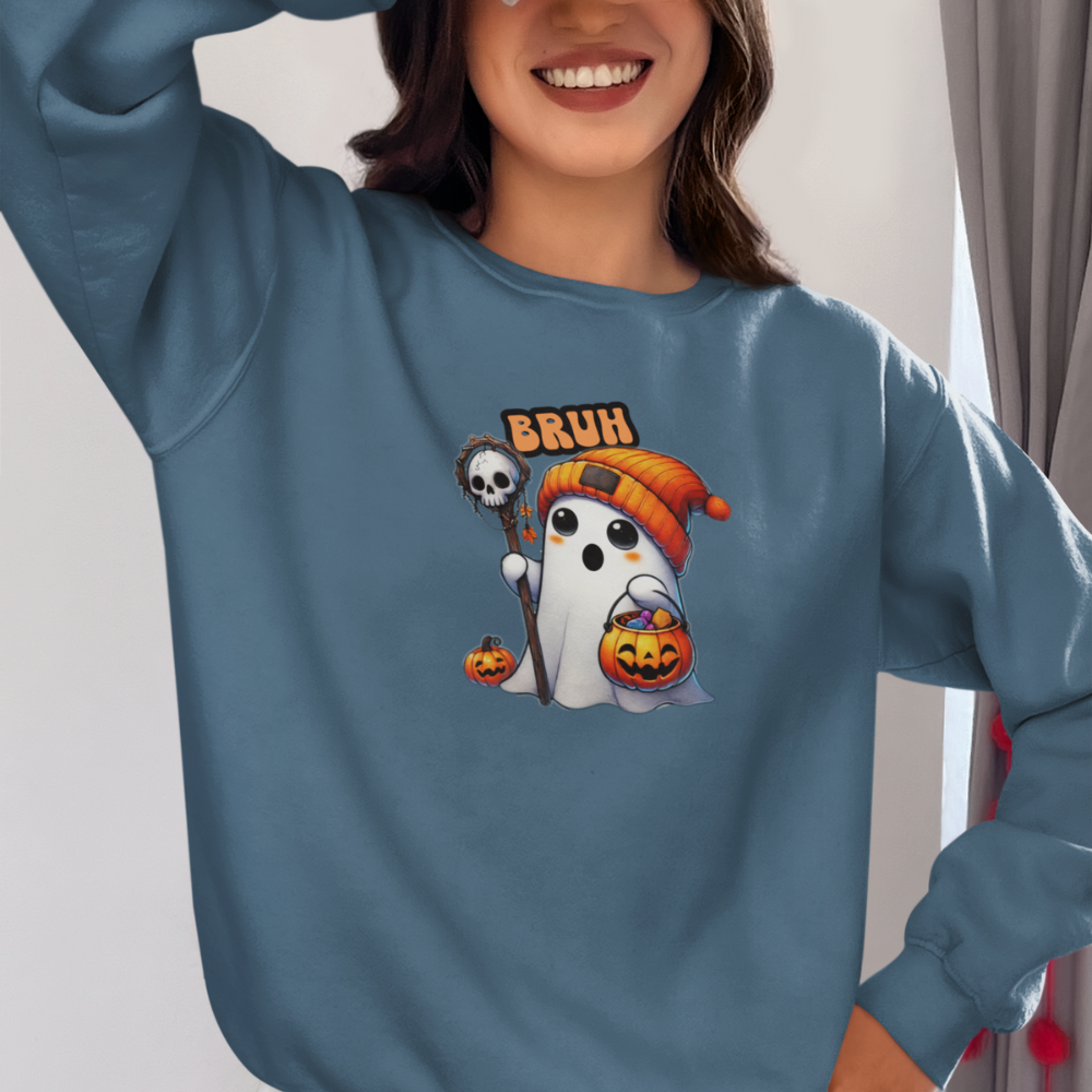 Person wearing a blue sweatshirt with a Halloween-themed design featuring a ghost and text.