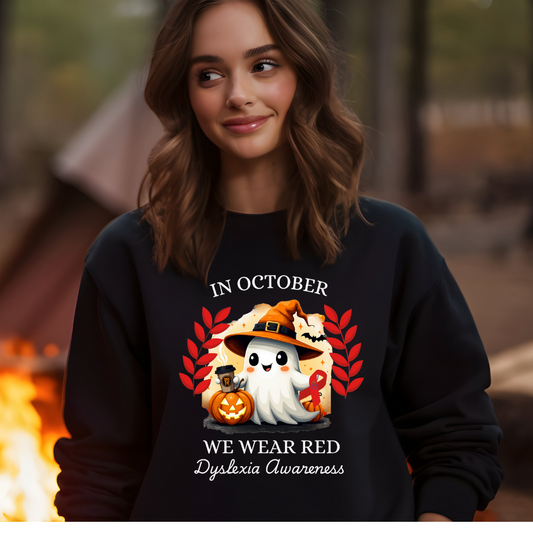 Person wearing a black sweatshirt with Halloween-themed design and text.