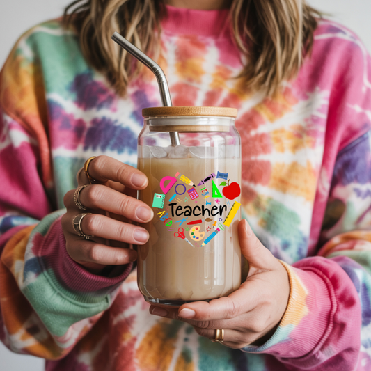 Person holding a jar with a straw, featuring a 'Teacher' design on a colorful background.