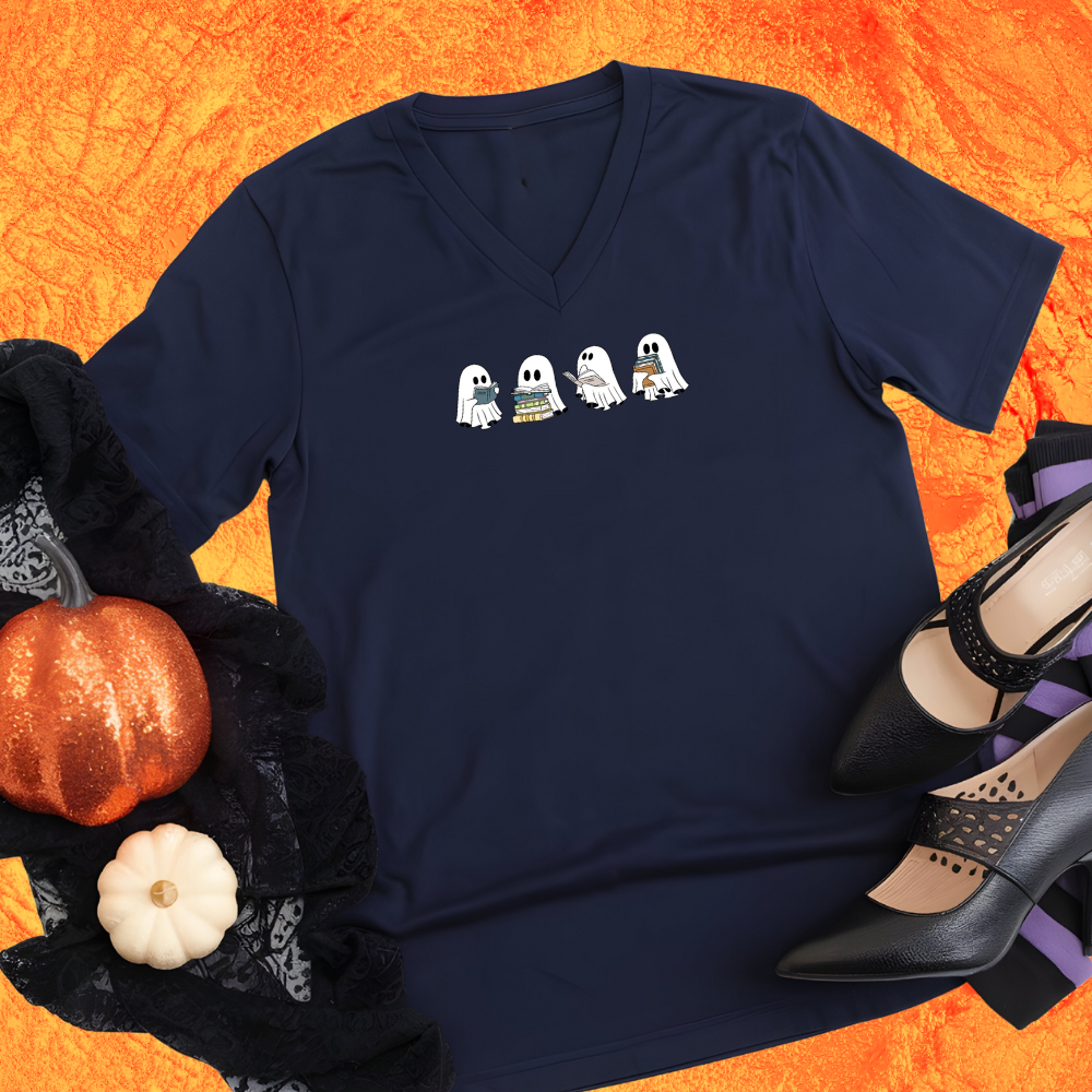 Navy blue t-shirt with ghost design on an orange background with Halloween items.