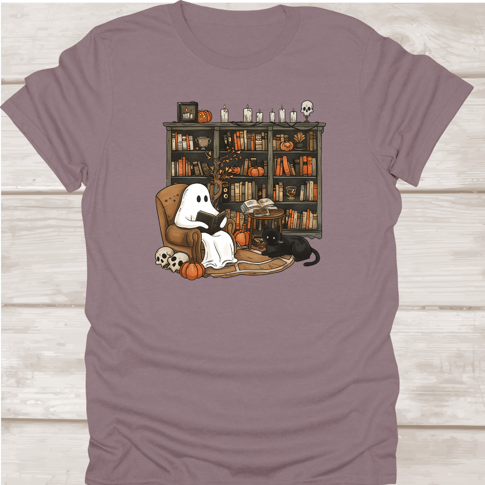T-shirt with a ghost and cat illustration on a wooden background